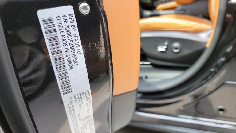 Car door sticker with VIN and assembly point